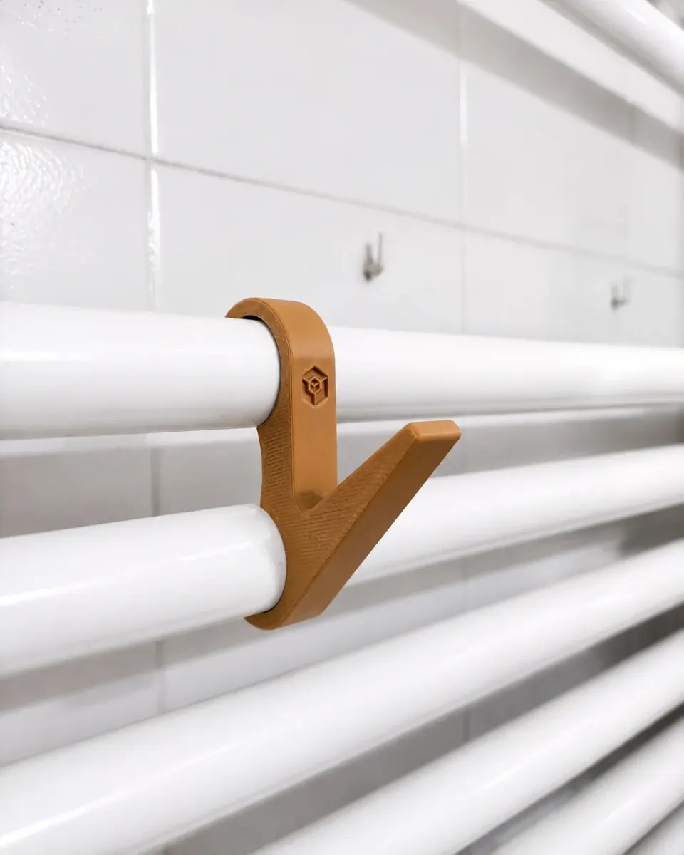 Colgador para radiador de baño